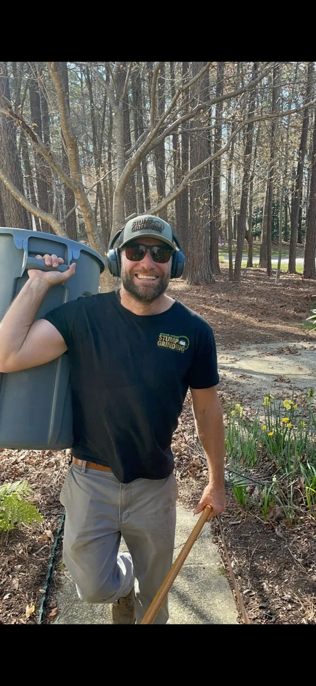 Taylor on site in a wooded area