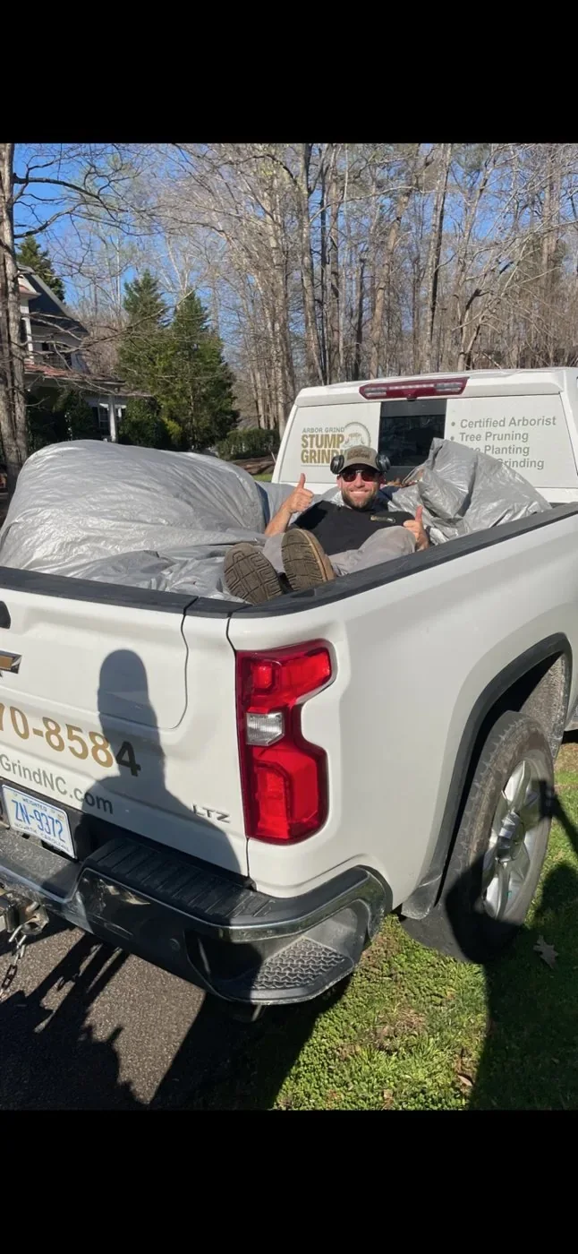 Taylor Jackson, ISA Certified Arborist, in his Arbor Grind truck